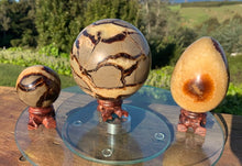 Load image into Gallery viewer, Septarian (Dragon Stone) Big 1.3kg Sphere, 325grams Egg, 175grams Sphere Set